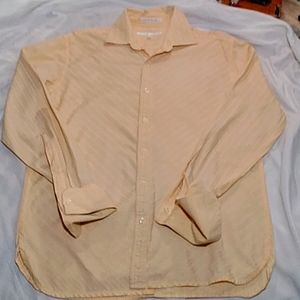 It's a Perry Ellis long shelve dress button down